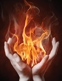 A pair of cupped hands holding a vibrant, glowing orange and yellow spiritual flame.