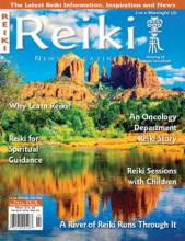 Reiki News Magazine Fall 2018 featuring red rock mountains reflecting in a calm river.