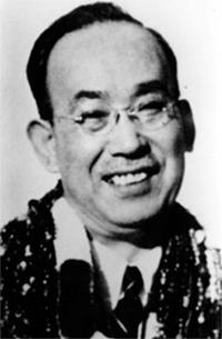 Black-and-white portrait of Dr. Chujiro Hayashi shown from the shoulders up.