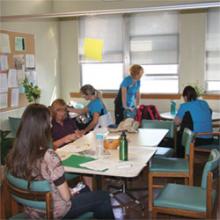 Volunteers meeting and lunch area waiting for hospital clients. Volunteers